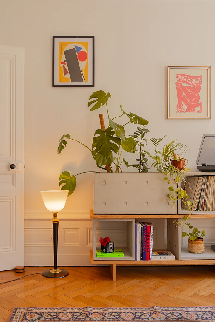 concrete and oak furniture inside of a haussmannian interior